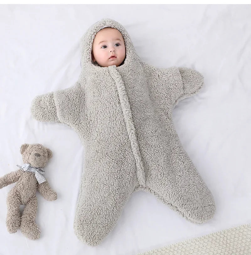 Baby wearing a long-sleeve hooded one-piece romper