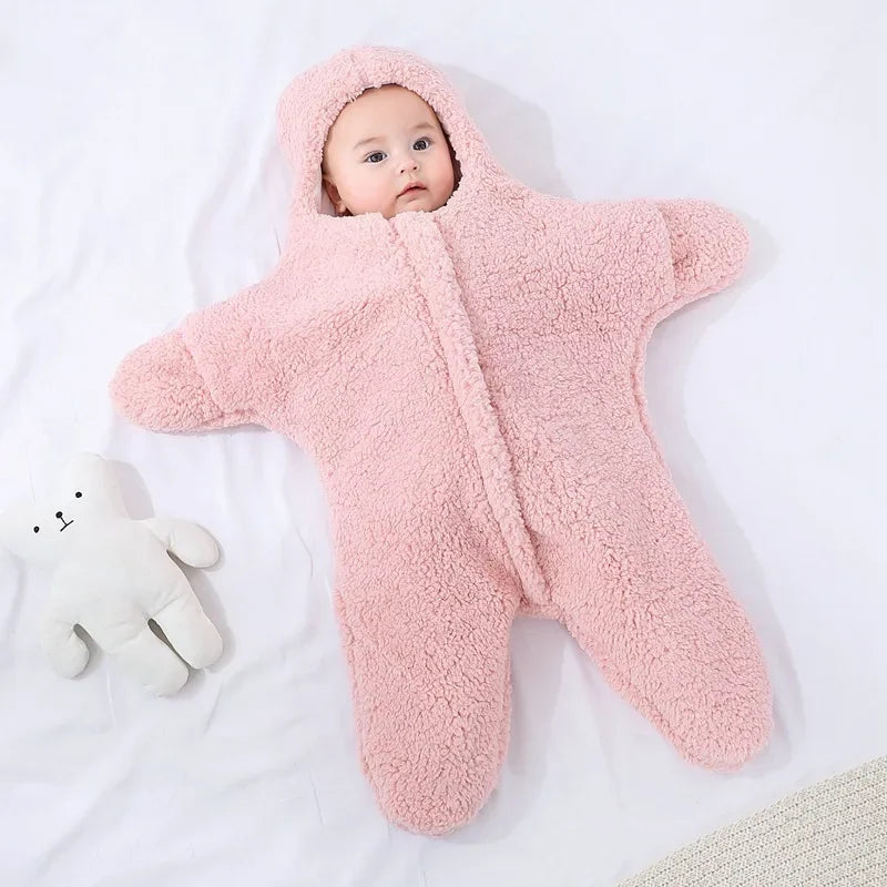 Baby wearing a long-sleeve hooded one-piece romper